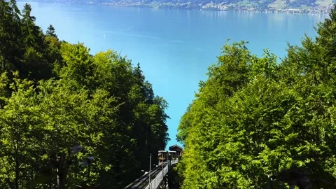 Oldest Cable Train in Europe in Giessbach with Lake Brienz and Mountain Stockbeeldmateriaal 264476305