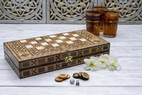 Oldest known board games Backgammon with cups of tee. Foto stock
