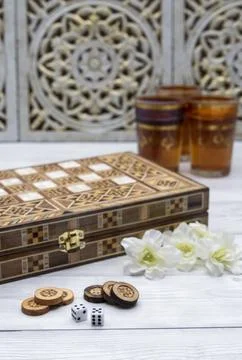 Oldest known board games Backgammon with cups of tee. Stock Photos