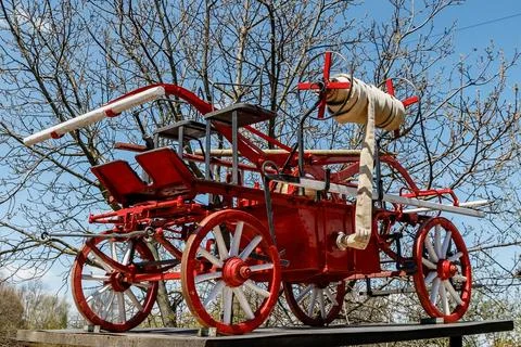 Oldtimer fire equipment - old red nostalgic fire cart Stock Photos