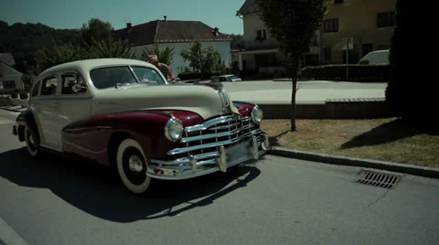 Oldtimer standing at the side of the roa... | Stock Video | Pond5