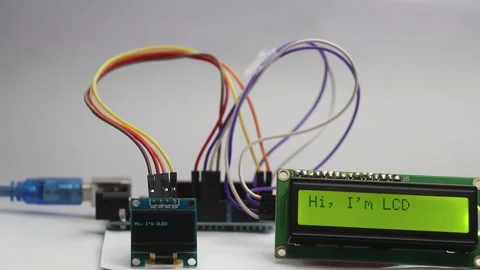 OLED and LCD display modules connected to a micro controller Stock Footage 310822225