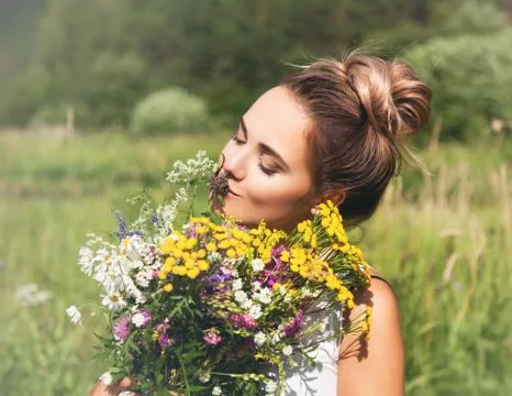 Olessya with flowers 4 Stock Photos