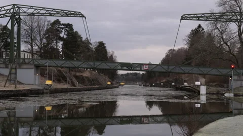 Olidebron Bridge and River Reflection in Canal, Trollhattan, Tilt Up Stock Footage 169995730