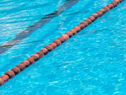 Olimpic swimming pool  orange float cork marking line Stock Photos
