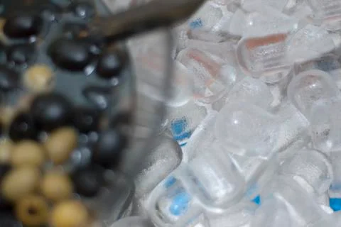 Olive and ice Stock Photos