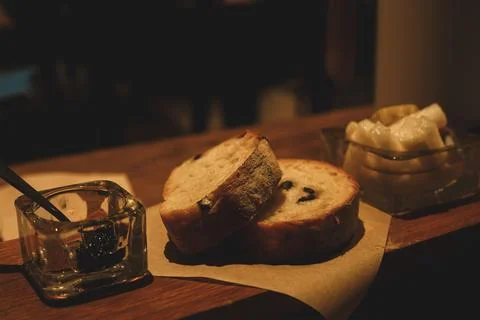 Olive Appetizer Bread and Black Olive Jam under Warm Light Stock Photos