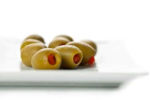 Olive fruit in white plate Stock Photos