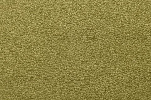 Olive green leather texture background with fine pebble grain pattern Stock Photos
