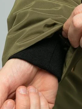 Olive jacket sleeve fabric fold Foto stock