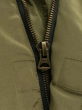 Olive jacket zipper pull close up Stock Photos