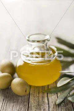Olive oil in the bottle Stock Photos