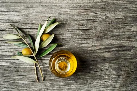 Olive oil in bottle Stock Photos