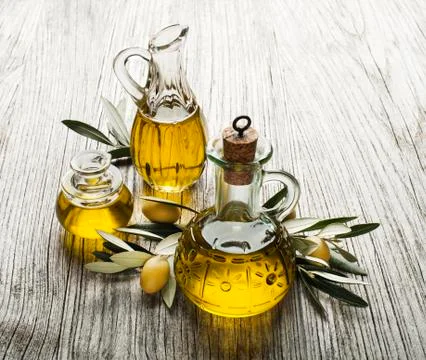 Olive oil in bottles Stock Photos