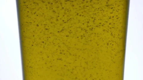 Olive oil bubbles slow motion 4k Stock Footage 147421311