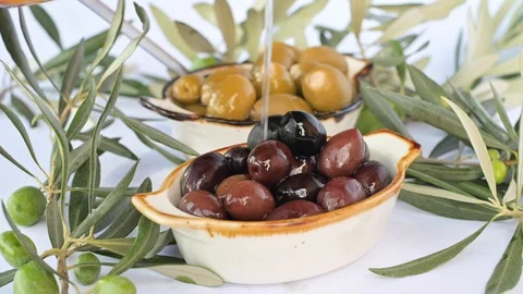 Olive oil flows through the olive. 動画素材 118215110
