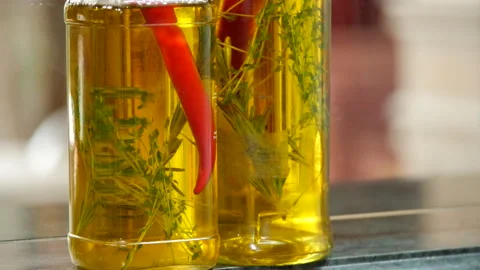 Olive Oil with Herbs Stock Footage 132106650
