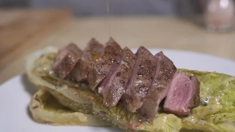 Olive oil onto the meat Stock Footage 127360181