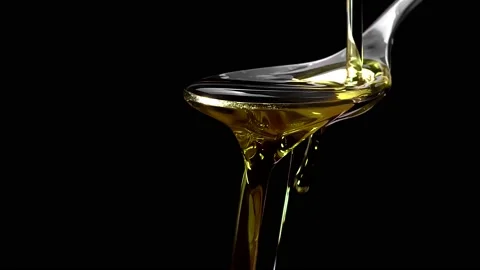 Olive Oil Pouring On a Spoon Stock Footage 191663196