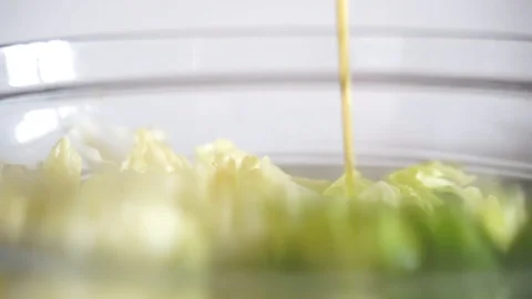 Olive oil on a salad Video stock 112202925