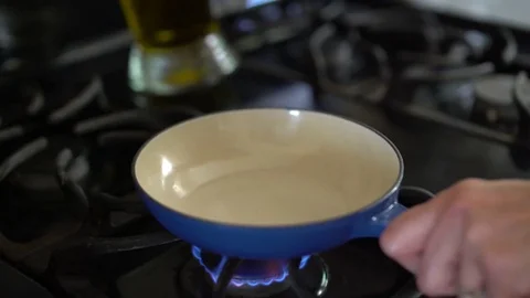 Olive oil on small pan Stock Footage 77329479