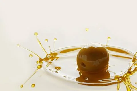 Olive oil splash Stock Photos