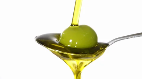 Olive oil on a spoon Stock Footage 34097036