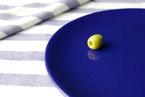 Olive on the plate Stock Photos