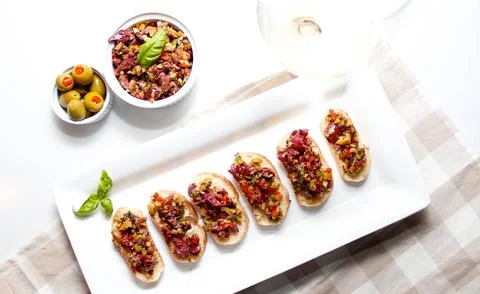 Olive Tapenade on a slice of Bread Stock Photos