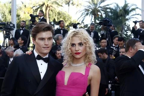  Oliver Cheshire and Pixie Lott attend the premiere of From The Land And T... Stock Photos