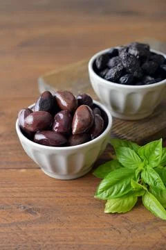 Olives in bowls Фото