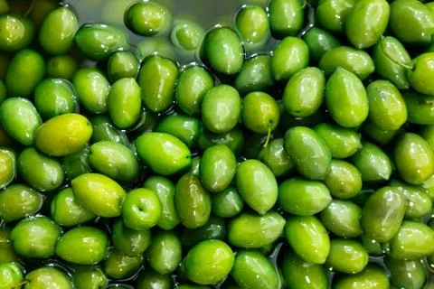 Olives in brine Stock Photos