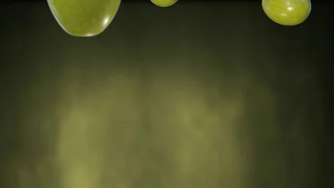 Olives falling with green background Stock Footage 71018699