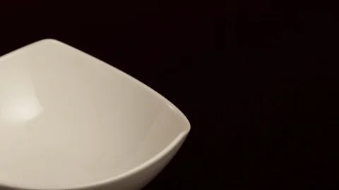 Olives Falling into a Plate Stock Footage 86136915