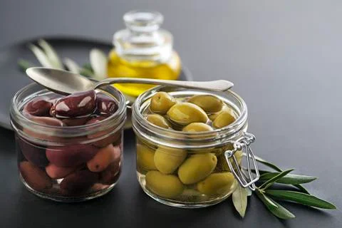Olives in jar Stock Photos