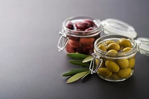 Olives in jar Stock Photos