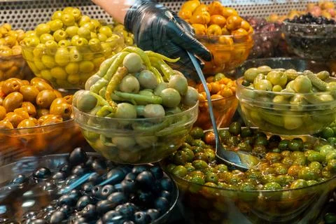 Olives marinated in different ways 스톡 사진