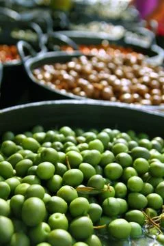Olives in pickling brine background texture Stock Photos