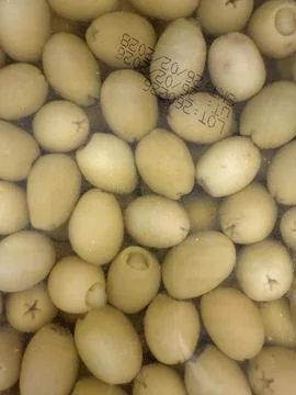 Olives submerged in liquid creating an appetizing background texture with a.. Stock Photos