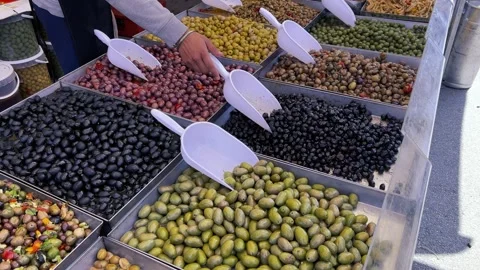 Olives of various types and various cooking processes displayed on stalls Stock Footage 274029968