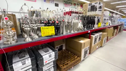 Ollies retail store interior pan lamps and furniture Stock Footage 174876661