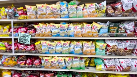 Ollies retail store interior pan bagged chip section Stock Footage 174908423
