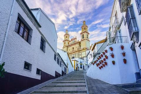 Olvera Cathedral with its steep streets with steps to reach the top of the Stock Photos