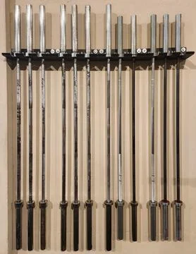 Olympic Bar Rack on a Wall Stock Photos
