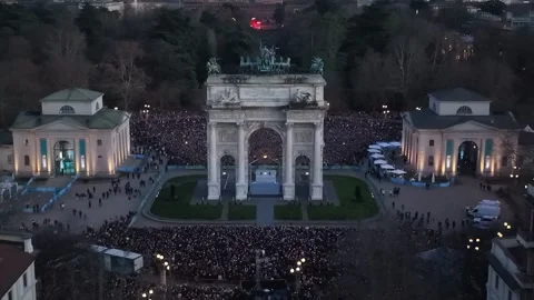 Olympic Cauldron Illuminates Arco della Pace in Milan Stock Footage 328999132
