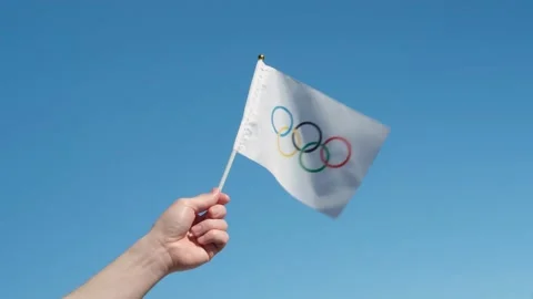 The Olympic flag, small in hand Stock Footage 152169050
