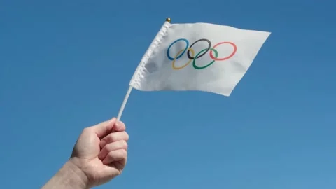 The Olympic flag, small in hand Stock Footage 152169385