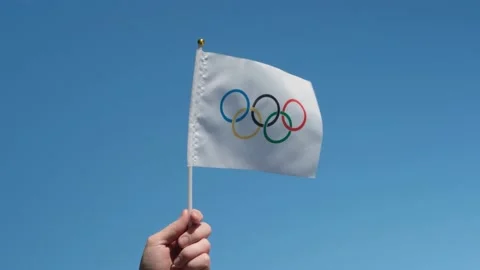 The Olympic flag, small in hand Stock Footage 152169438