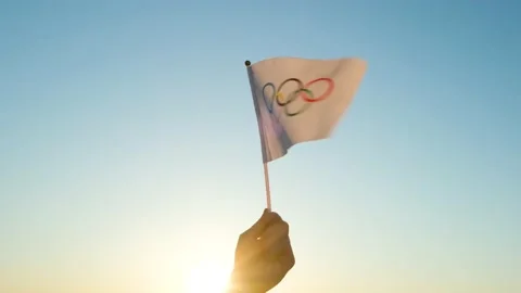 The Olympic flag, small in hand Stock Footage 152233801