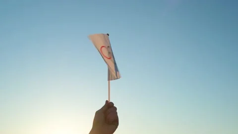 The Olympic flag, small in hand Stock Footage 152233873